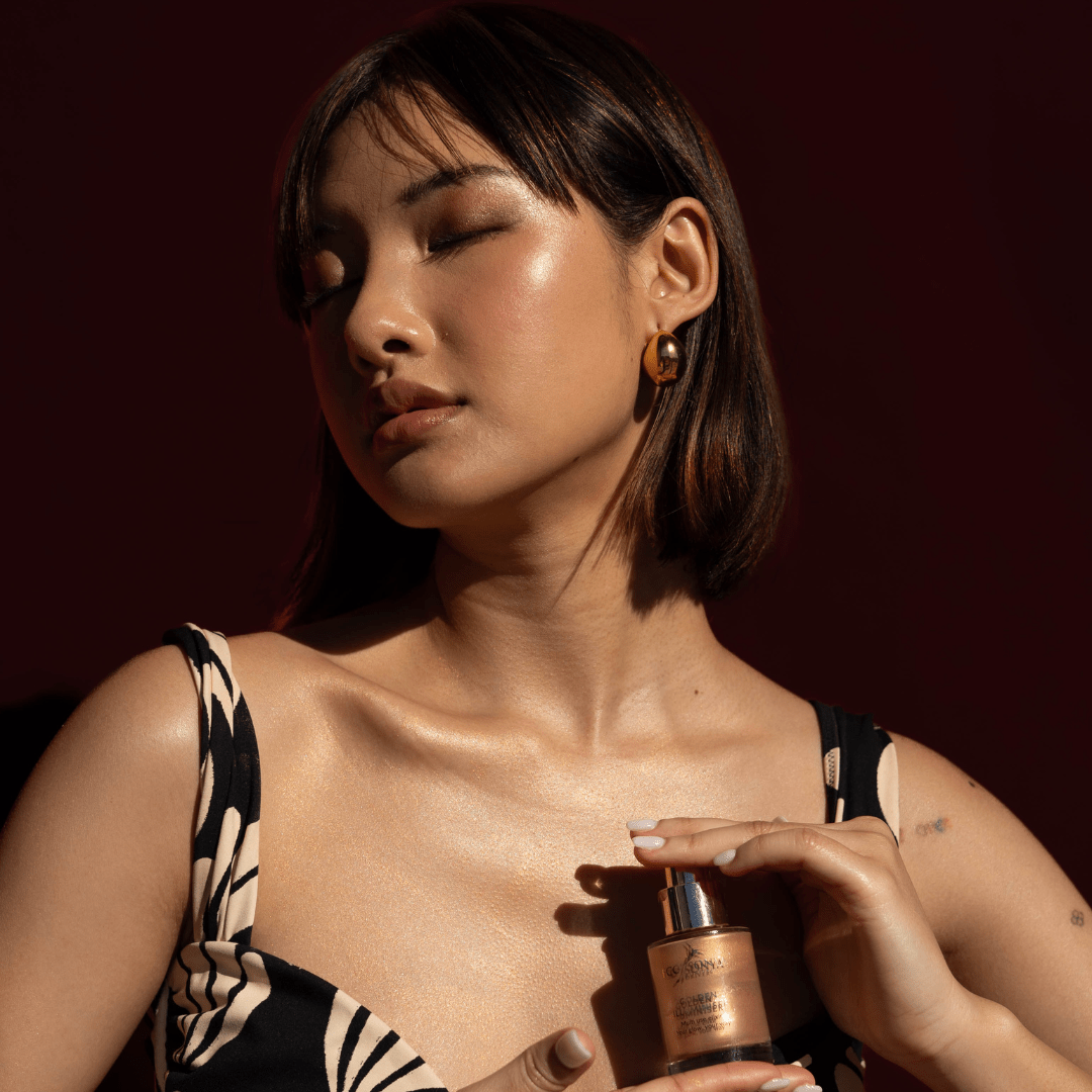 Woman holding Golden Illuminiser next to her body - Eco By Sonya New Zealand