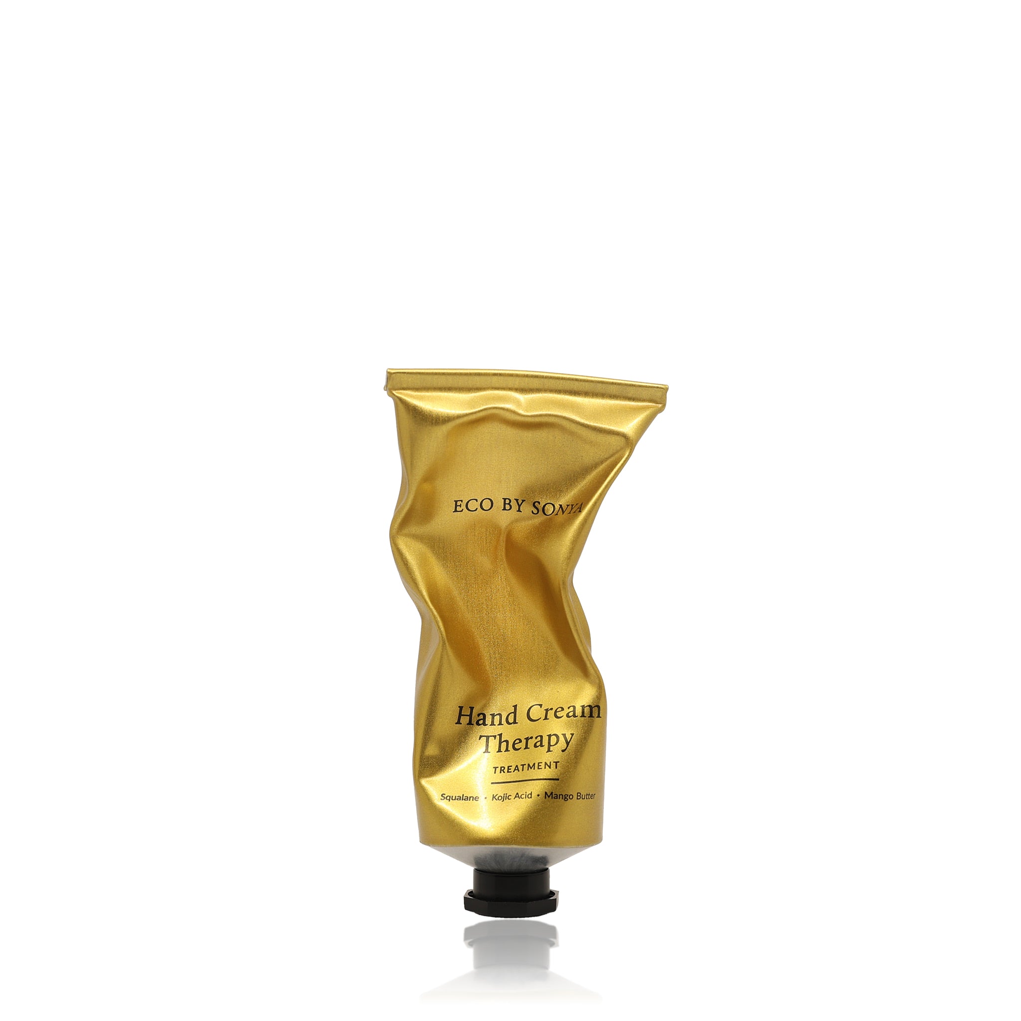 Eco By Sonya Hand Cream Therapy Treatment in a scrunched gold tube with a black cap.