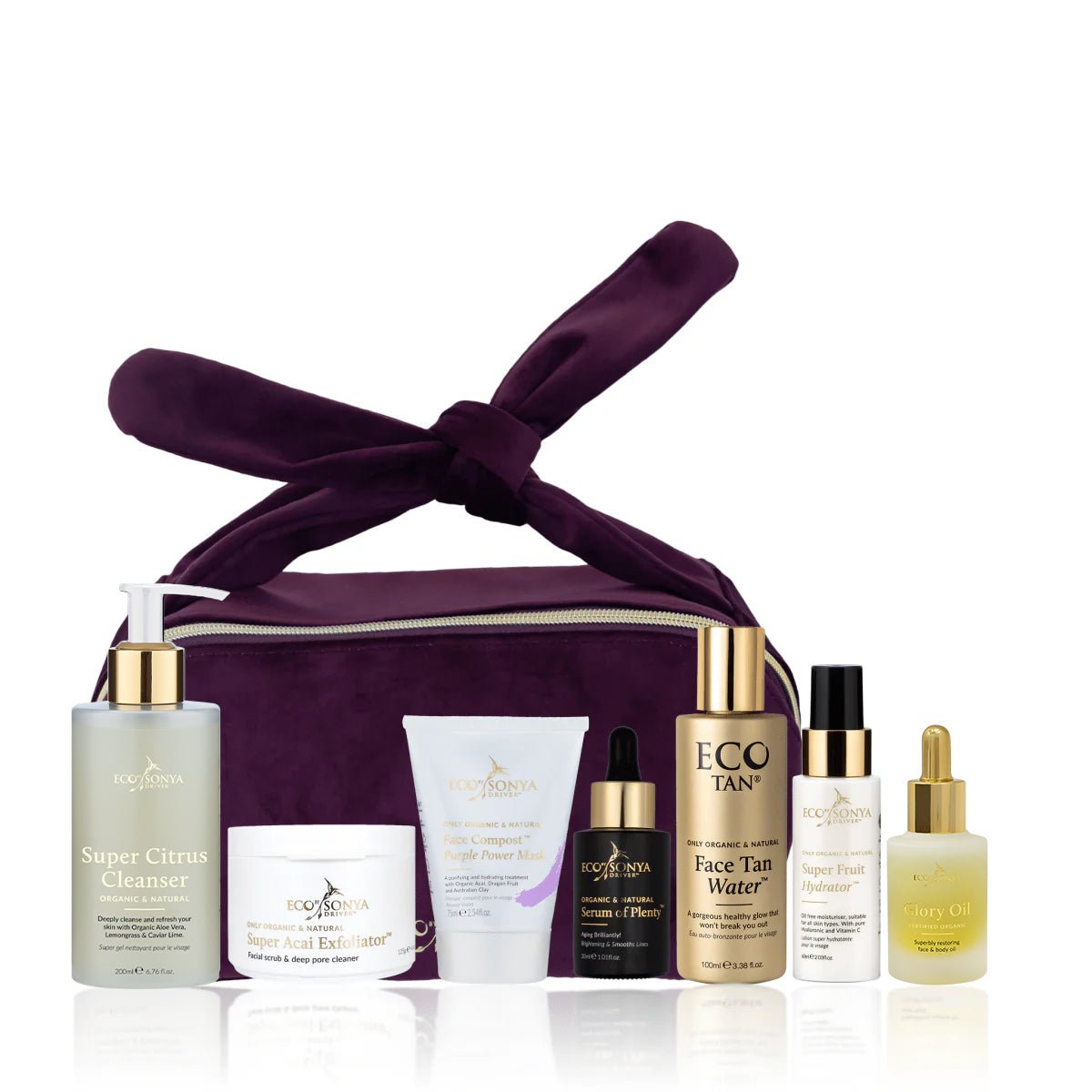 Set of skincare products with a purple bag on a white background