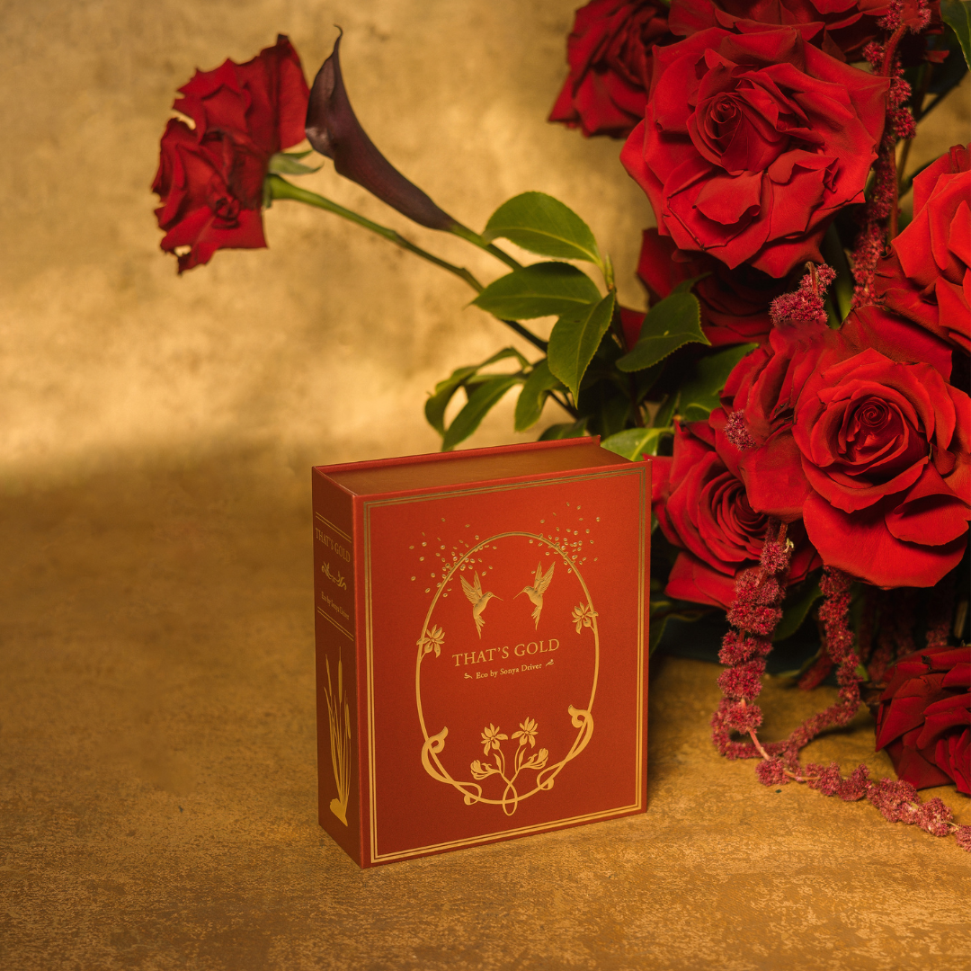 Eco by Sonya That's Gold gift box on gold background with roses